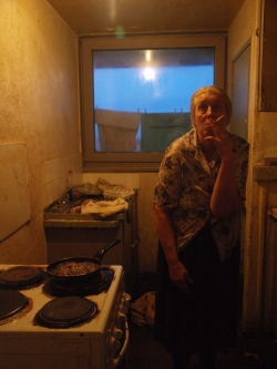 Sylvia prepares diner in her kitchen Sylvia prepares diner in her kitchen
